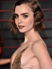 Lily Collins nude .